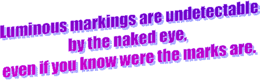 Luminous markings are undetectable
by the naked eye, 
even if you know were the marks are.
